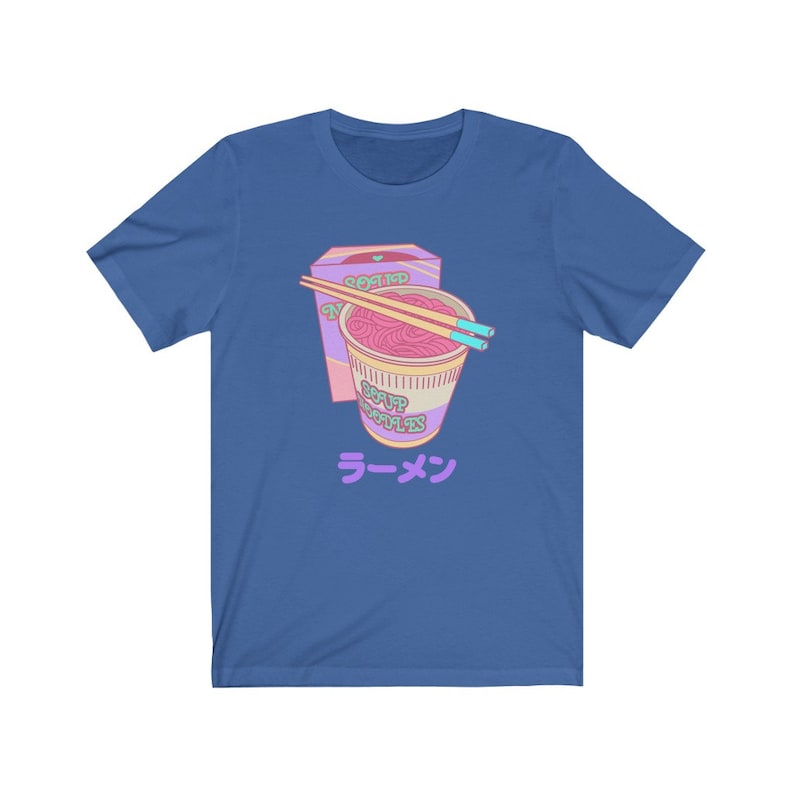 May include: A blue t-shirt with a cartoon image of a pink and purple instant ramen cup with chopsticks and a box that says "Roasted Noodle Soup" and "Ramen" in Japanese.