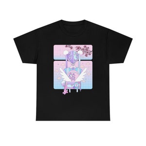 May include: Black t-shirt featuring a colorful graphic design. The design includes a backpack with angel wings, a bunny-like character, and cherry blossoms. The color palette is pastel with pink, blue, and purple hues.