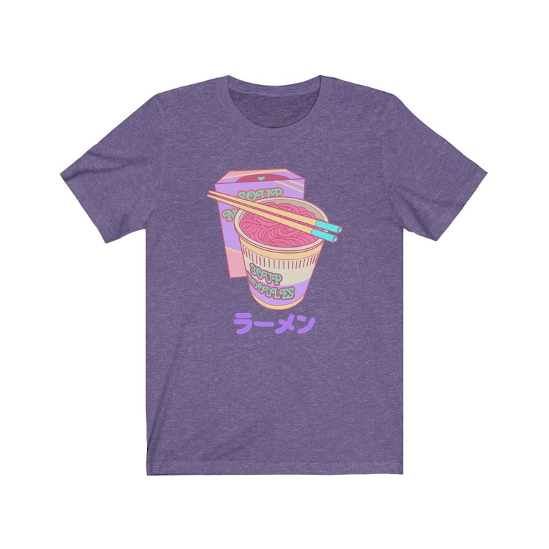 May include: Purple t-shirt with a cartoon illustration of a pink and purple instant ramen cup with chopsticks and the text "Ramen" in Japanese.