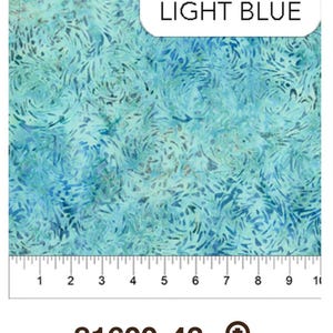May include: Light blue fabric with a swirling, abstract pattern. The fabric is measured in inches with a ruler. The fabric is labeled "81600-43" and "LIGHT BLUE".