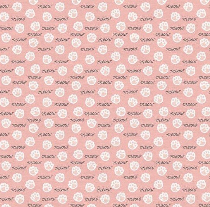 May include: A pink background with a repeating pattern of white paw prints and the word "meow" written in a cursive font.