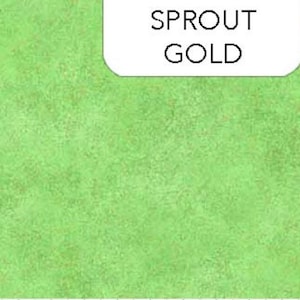 May include: A solid green textured fabric with the words "SPROUT GOLD" printed in black.