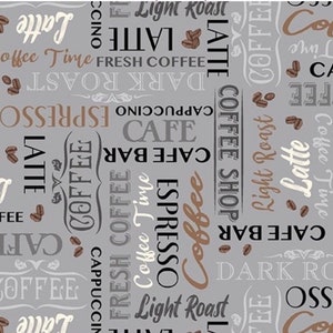 May include: A gray and white patterned fabric with various coffee-related words and phrases, including "Latte", "Espresso", "Coffee Shop", "Cafe Bar", "Dark Roast", and "Light Roast".