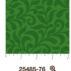 May include: Green fabric with a repeating pattern of stylized leaves and swirls. The fabric is measured in inches.