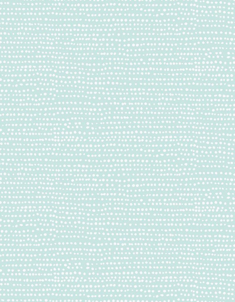 Puede incluir: Un fondo azul claro con un patr&oacute;n de lunares blancos.