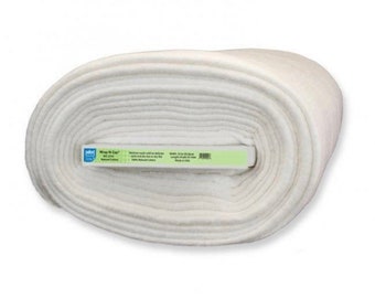 May include: A white roll of Wrap N' Zap batting, a natural cotton batting for quilting and crafts. The label reads "Wrap N' Zap, 80/20 Natural Cotton, Machine wash cold and dry on low heat, 60 in x 90 in, Made in USA."