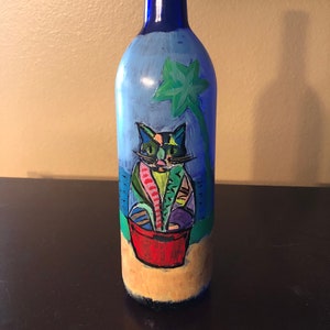 Crazy Colored Cat in a Beach Pail original painted wine bottle by Michele Volpe