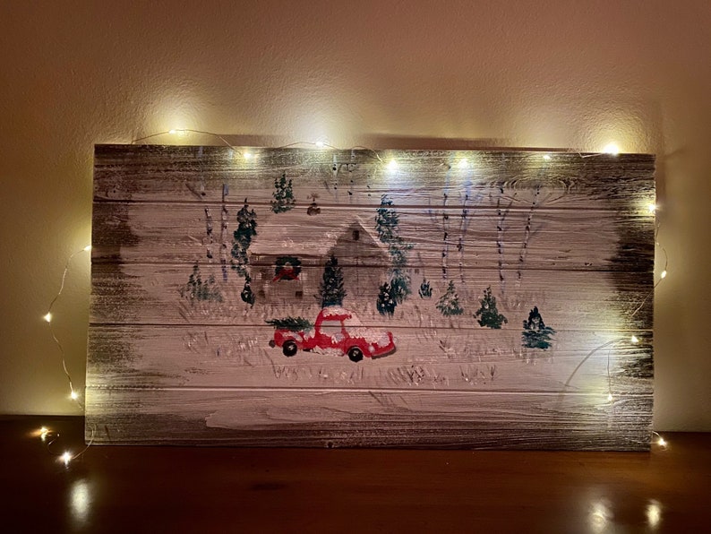 Bringing Home the Christmas Tree by Michele Volpe on a 26 12 inch by 14 12 inch wood pallet panel painted with acrylic paints