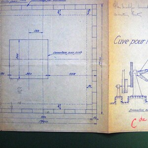 May include: A hand-drawn blueprint for a 1 cubic metre turbulent tank. The blueprint includes dimensions in centimetres and the text "Cuve pour turbulent de 1m3 ext!" and "C de 25158 Zmar".