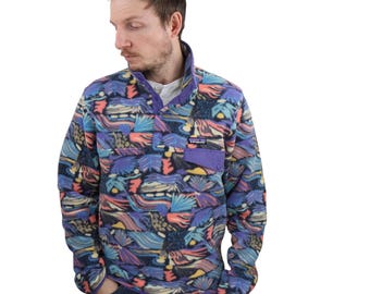 Y2K Patagonia Aztec Joy Pitch Blue Tribal All Over Print Synchilla Fleece Snap T Pullover Jacket Mens Small Womens Medium Animal Purple Pink