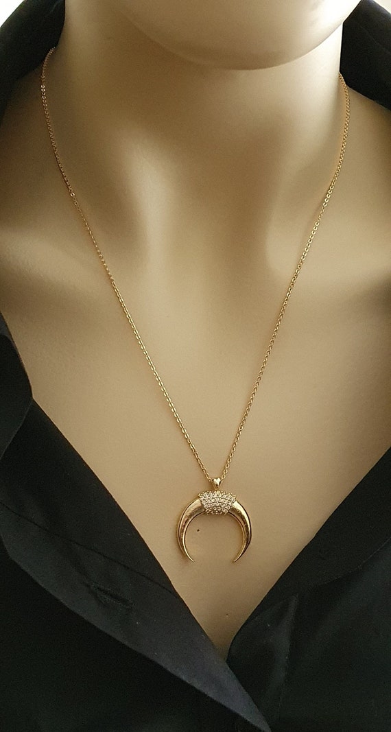 Gold crescent horn best sale necklace
