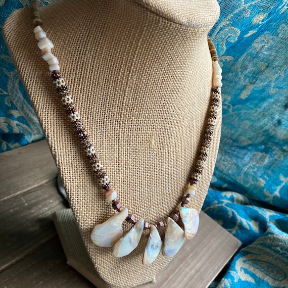 BlueRica Shark Tooth Pendant on Puka Shell Beads, India | Ubuy