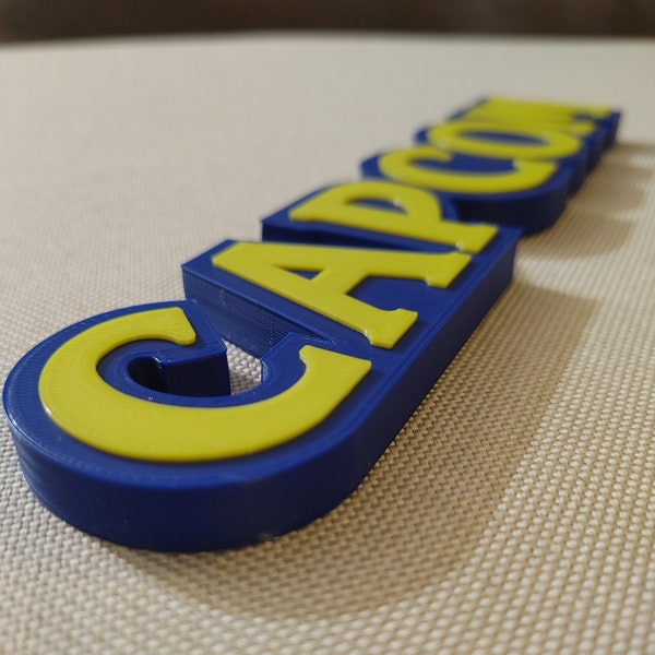 Capcom video game logo sign 8.25in (3D printed, man cave, game room, videogame, decor, gaming, gamer, gift, stocking stuffer)