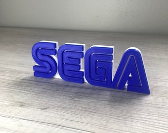 Letrero con el logotipo del videojuego SEGA de 6 pulgadas (impreso en 3D, para sala de juegos, estantería, pared, videojuego, decoración, juegos, regalo para jugadores, regalo para calcetines)