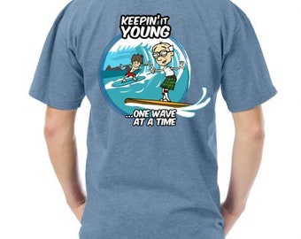 Best Funny Surf Tee...Our “One wave at a Time” surf design on a premium Ultra Cotton t-shirt. Multiple colors.