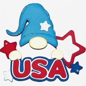May include: A red, white, and blue gnome holding a sign that says "USA". The gnome is wearing a blue hat with a white star on it. There are stars around the gnome.