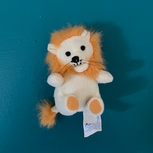 Tiny &#39;Lion&#39; Plush Toy
