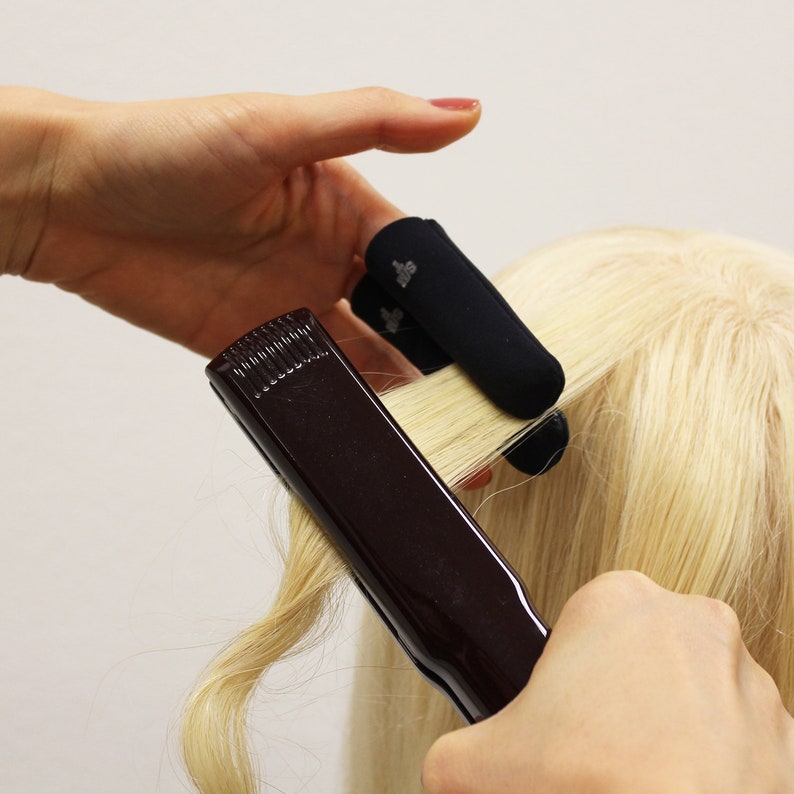 Heat Shield Finger Protectors Help Prevent Painful Burns From Curling