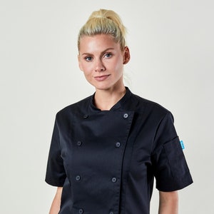 May include: A black short-sleeved chef jacket with a double-breasted closure and a patch pocket on the left sleeve.