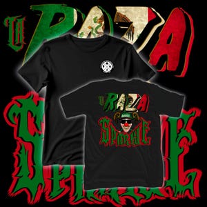 May include: Two black t-shirts with graphic designs. One shirt features a white logo on the chest. The other displays the word "RAZA" and a clown graphic with the words "SPIRAL" in red and green, with a Mexican flag design.