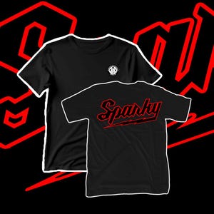 May include: Two black t-shirts with white outlines are displayed against a black background with red graphic elements. One shirt has a small logo, the other features the word "Sparky" in red script across the back.