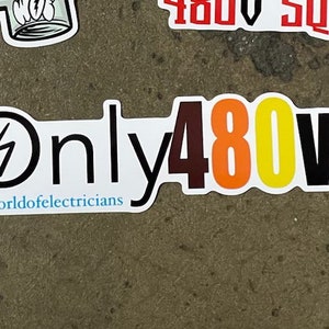 May include: A white sticker with black text that reads "Only 480V" with a black lightning bolt in a circle to the left of the text. The numbers 480 are in brown, orange, and yellow. The text "@worldofelectricians" is below the main text.