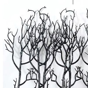 Peut inclure: Un bouquet de branches de brindilles noires avec un aspect naturel et rustique. Les branches sont fines et ont de nombreuses petites branches qui en sortent. Elles sont parfaites pour ajouter une touche de nature à votre décoration intérieure.