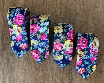 4 matching groomsmen blue flower slim ties