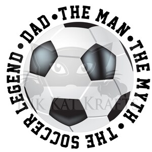 May include: A soccer ball graphic with the text "LEGEND DAD THE MAN THE MYTH THE SOCCER". The design features a black and white soccer ball with a circular text arrangement, suitable for sports-themed gifts.