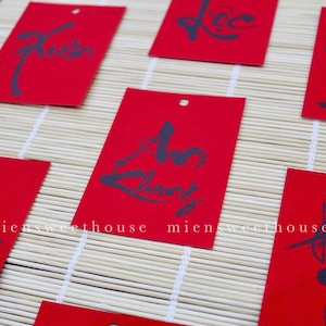 Vietnamese New Year Calligraphy Ornaments: Lucky Red Decor (100pcs)
