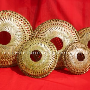 May include: A set of five circular woven bamboo baskets of varying sizes, each featuring a distinct open center and a light tan natural finish. The text miensweethouse is printed in white across the center of the baskets.