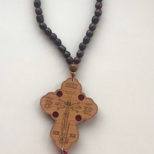 rosary wooden carved with a cross handmade