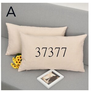 May include: Two beige linen pillow covers with the number 37377 printed on the front of the top pillow.