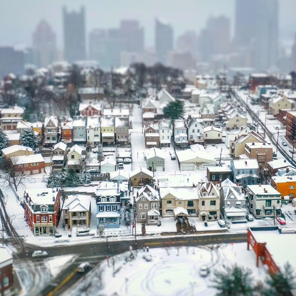 Homes on Mount Washington after a fresh coat of snow and the Pittsburgh skyline