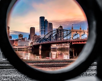The Smithfield St. bridge through the fence hole near Station Square.