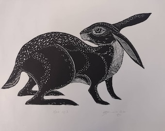 May include: Black and white linocut print of a hare with its ears raised. The print is signed "Hare No. 3" and "Emma Warren Cole" in the bottom right corner.