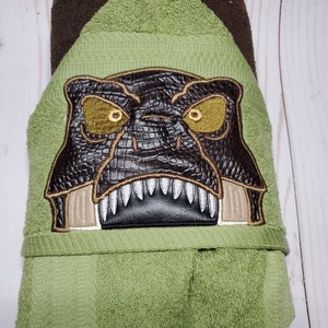 Personalized T-Rex Hooded Towel Peeker. Machine Embroidered dinosaur image 1