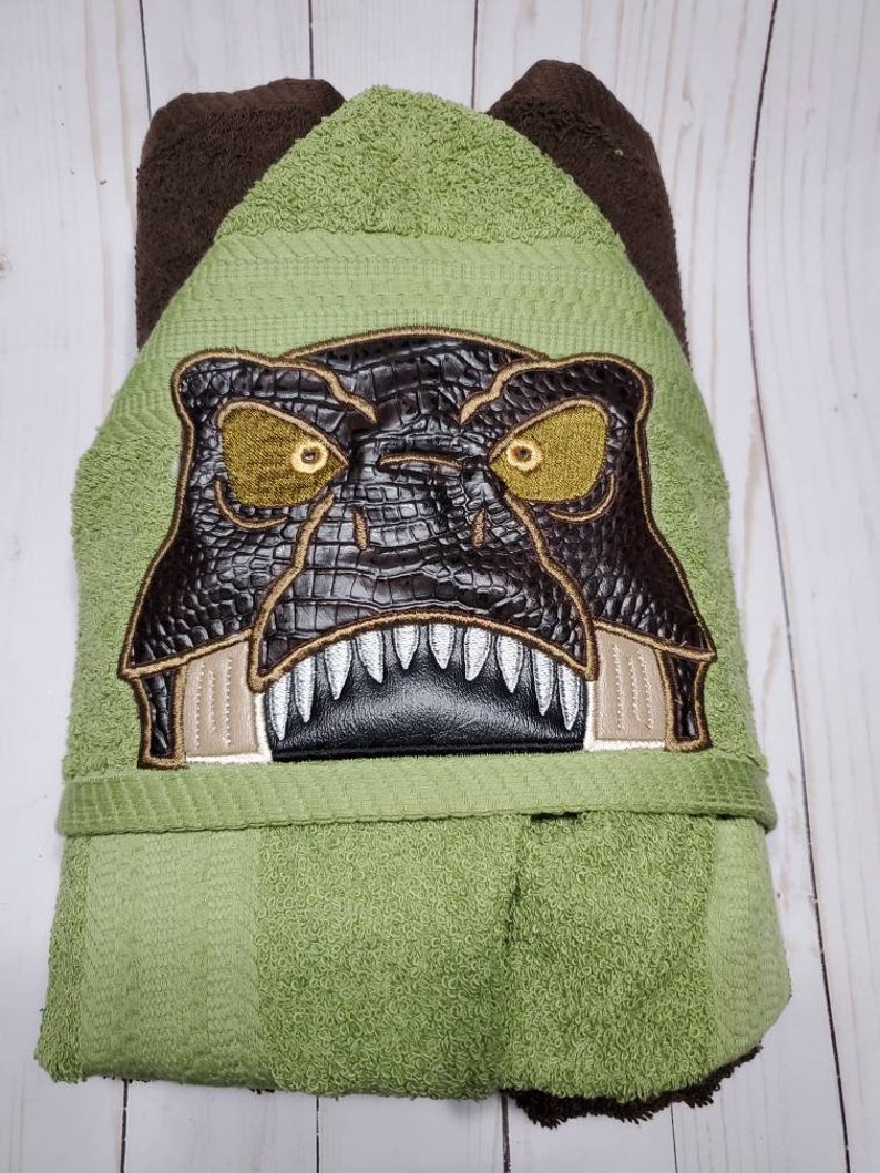 Personalized T-Rex Hooded Towel Peeker. Machine Embroidered dinosaur image 1