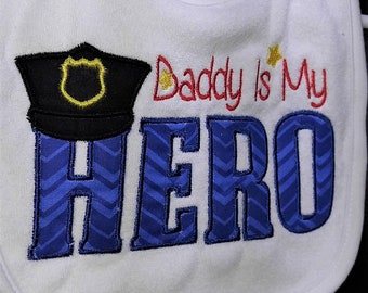 Daddy is My Hero police man applique machine embroidered infant toddler white bib.