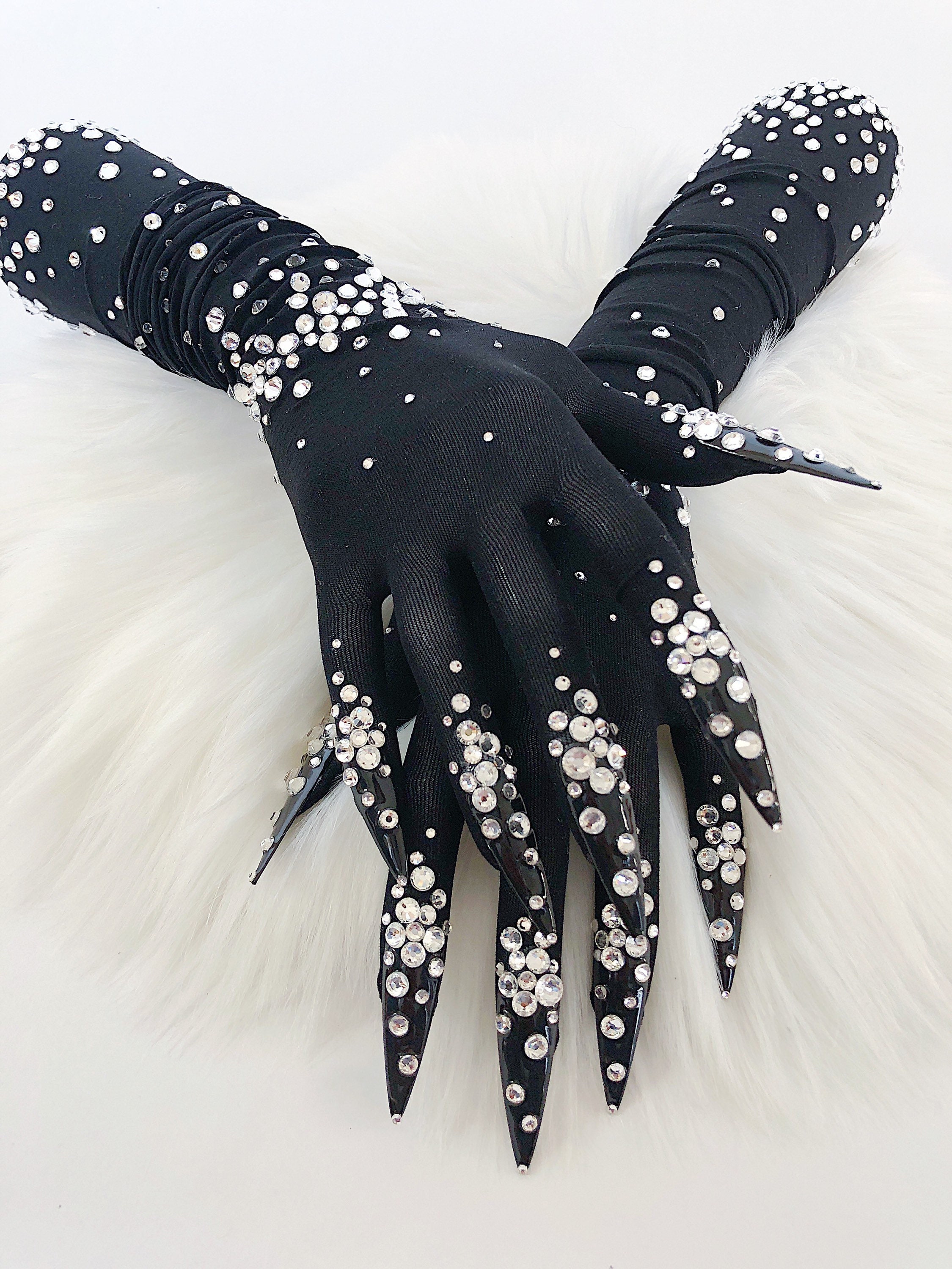 Sheer faux skin nail gloves with red stiletto nails and red glass rhinestones for drag queens burlesque performers and Dancers