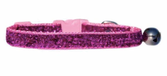 pink collar with bell
