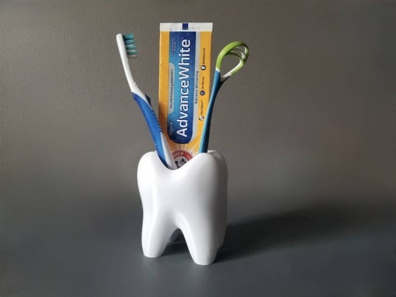 Tandvormige beker voor tandenborstel en tandpasta badkamerdecoratie afbeelding 1