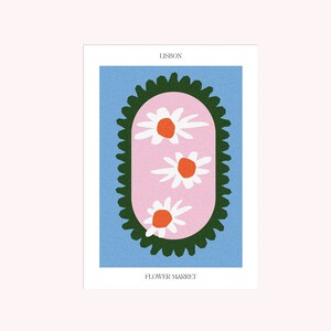 May include: A pink and white illustration of daisies with green foliage in a circle on a light blue background. The text "LISBON" is at the top and "FLOWER MARKET" is at the bottom.