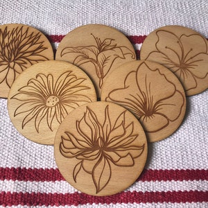 Wooden engraved flower coasters
