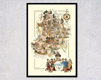 May include: A vintage illustrated map of the Auvergne region of France, featuring a compass rose, stylized depictions of local landmarks, and people in traditional clothing. The map is framed in a black frame and has a white background.