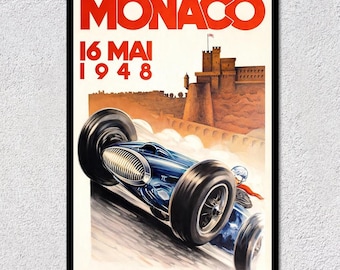 Può includere: Poster vintage per il Gran Premio di Monaco, con un'auto da corsa blu in movimento. Il poster mostra la parola "MONACO" in rosso, con la data "16 MAI 1948" in basso. Un castello è visibile sullo sfondo.