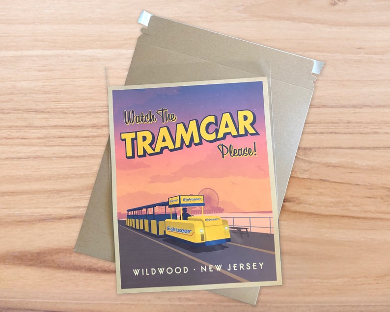 May include: A vintage-style postcard featuring a yellow tramcar with the text "Watch the Tramcar Please!" and "Wildwood, New Jersey". The tramcar is driving along a boardwalk with a Ferris wheel in the background.