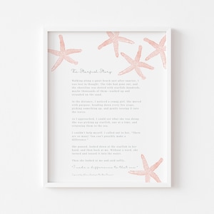 May include: A framed print featuring the text "The Starfish Story" with a poem and illustrations of pink starfish. The white frame surrounds the print, which is set against a white background.