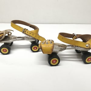 Roller skates GERMINA - Metal children's sport shoes - Adjustable size roller skating - Yellow leather straps - Roller-skates on wheels '80s
