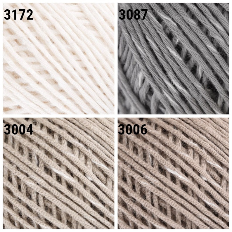 May include: Four skeins of yarn in different colors: white, gray, beige, and a darker beige. Each skein has a number printed on the label: 3172, 3087, 3004, and 3006.